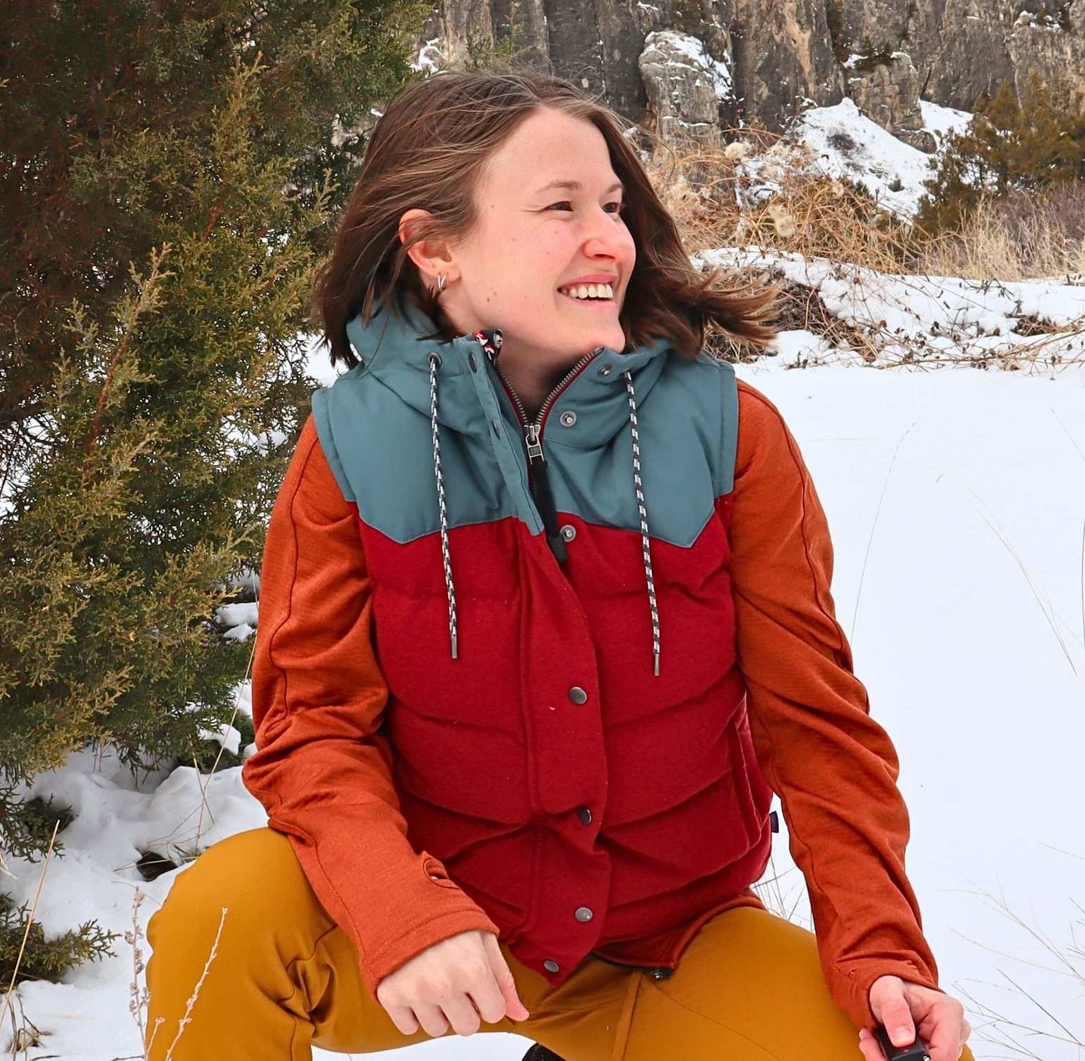 Person in eco-friendly outdoor gear in natural environment